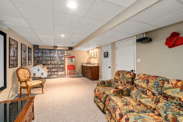 a view of a house with backyard porch and sitting area