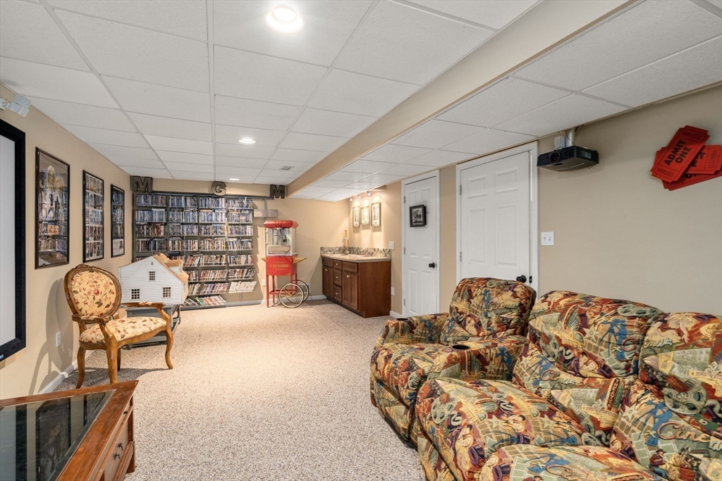 63 High Street Shrewsbury, MA 01545 - Photo 37 of 40 a bedroom with furniture and a window