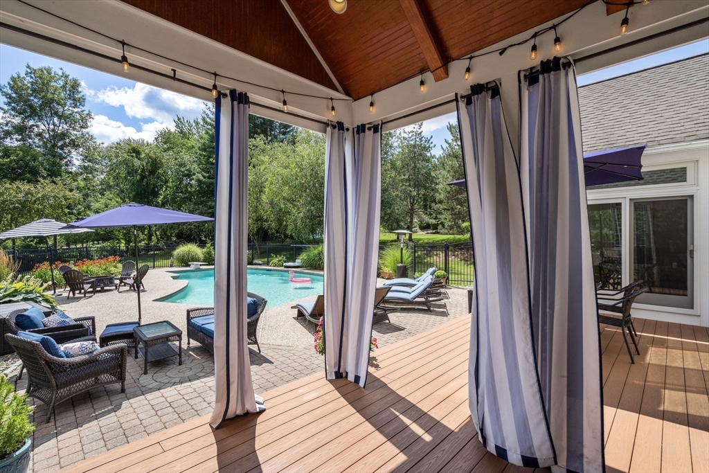 63 High Street Shrewsbury, MA 01545 - Photo 8 of 40 a view of porch with seating space