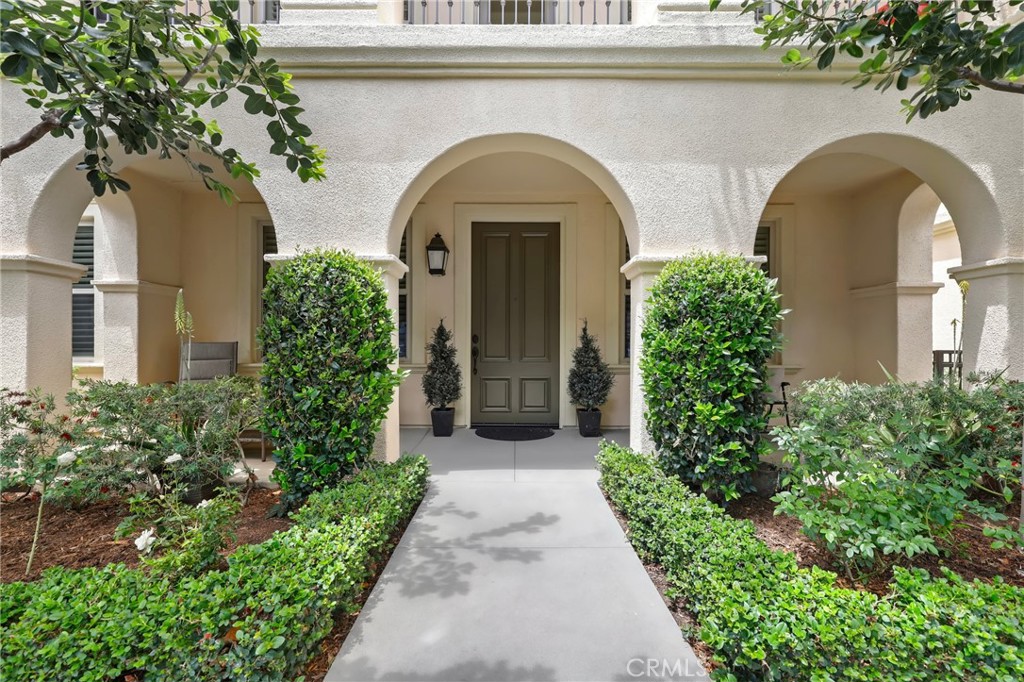 59 Kempton Irvine, CA 92620 - Photo 1 of 29 a front view of a house with a garden