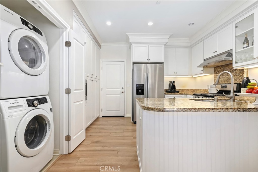 59 Kempton Irvine, CA 92620 - Photo 14 of 29 a view of a kitchen with a washer and dryer
