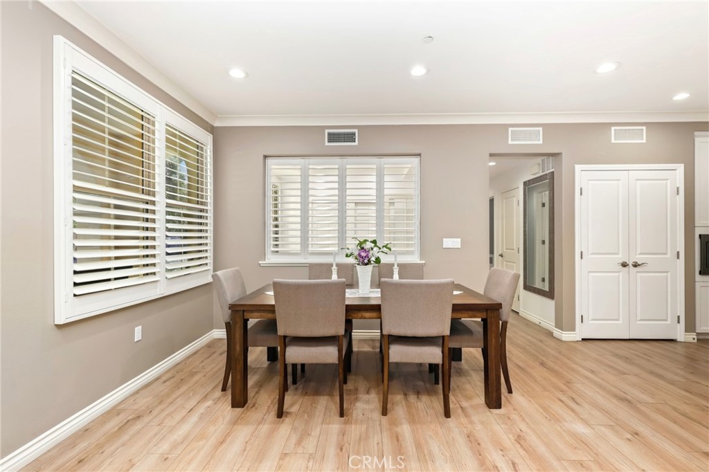 59 Kempton Irvine, CA 92620 - Photo 15 of 29 a view of a dining room with furniture and wooden floor