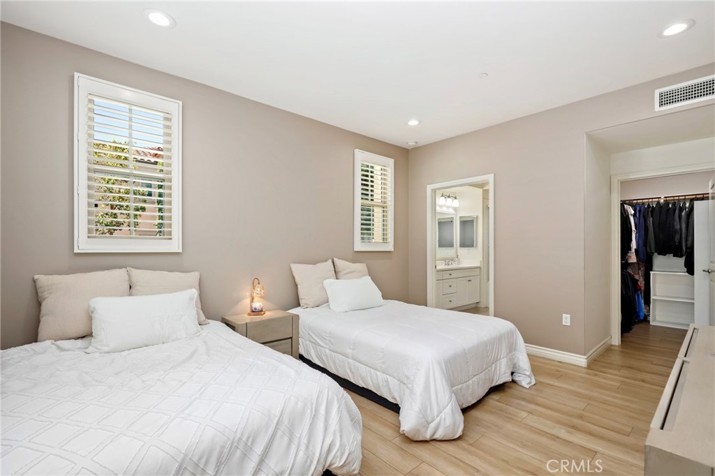 59 Kempton Irvine, CA 92620 - Photo 16 of 29 a bedroom with two beds and a window