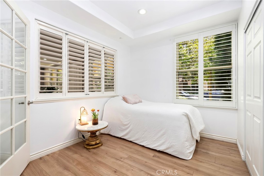 59 Kempton Irvine, CA 92620 - Photo 20 of 29 a bedroom with a bed and a window