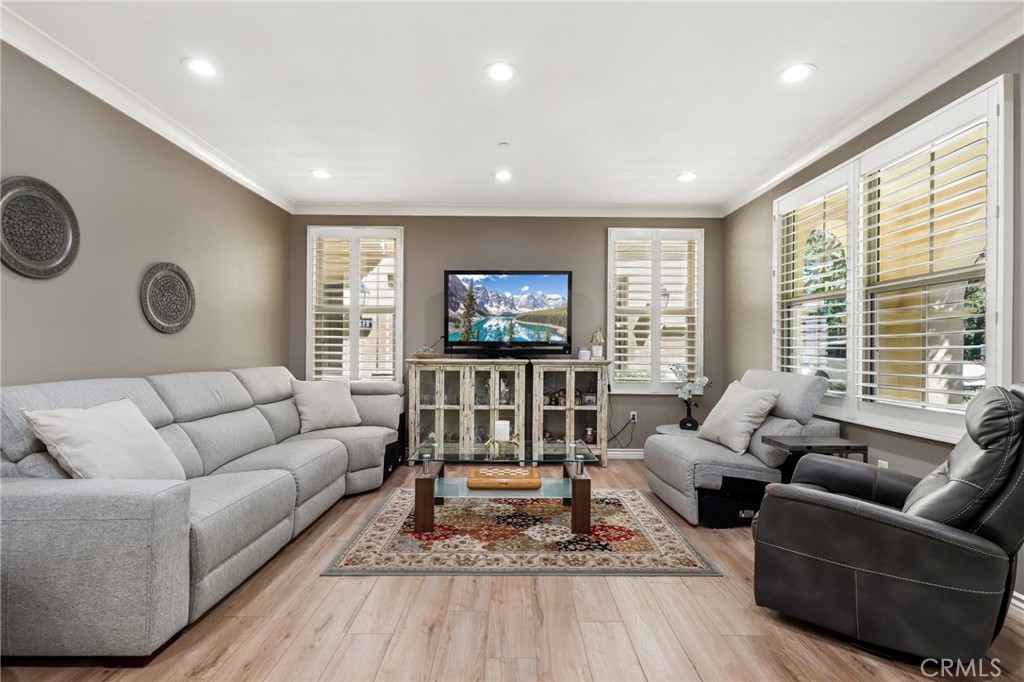59 Kempton Irvine, CA 92620 - Photo 6 of 29 a living room with furniture and a flat screen tv