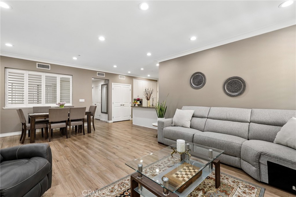 59 Kempton Irvine, CA 92620 - Photo 8 of 29 a living room with furniture and wooden floor