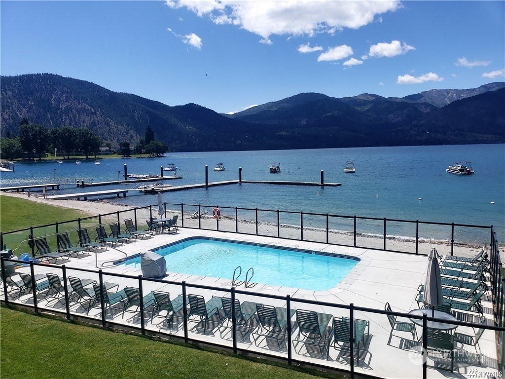 a view of a swimming pool with a mountain
