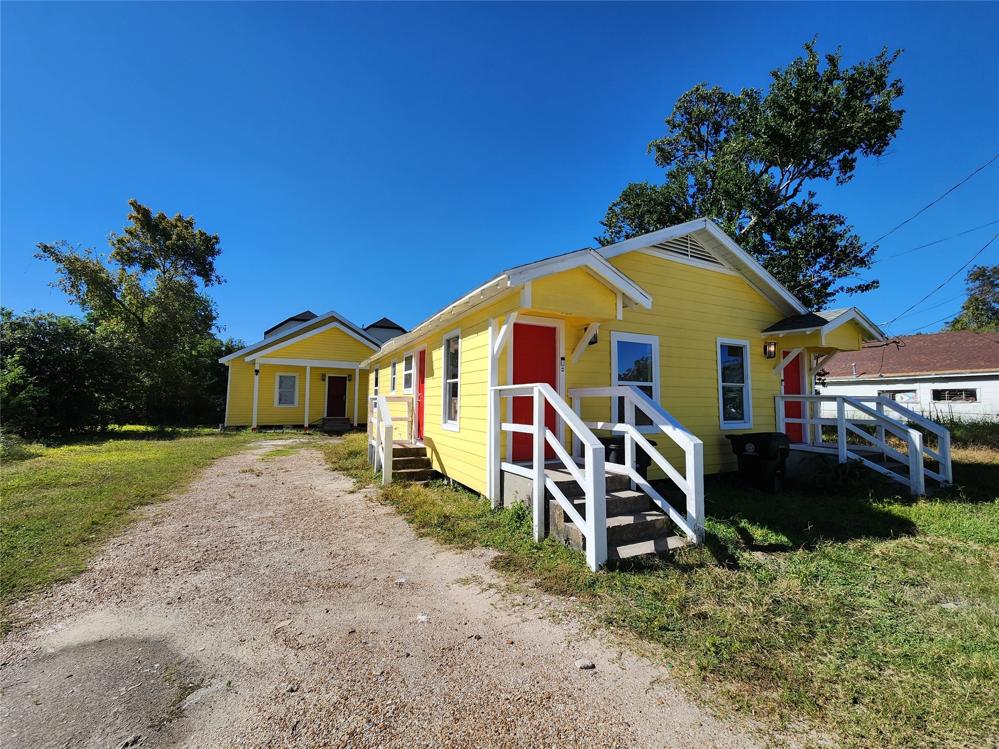 2706 Berry Street, Unit B Houston, TX 77004 - Photo 2 of 10 a view of a house with a yard