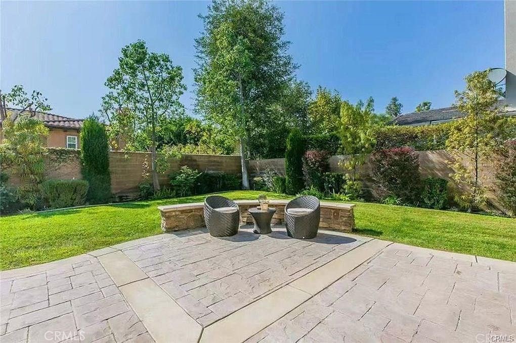 32 Walnut Creek Irvine, CA 92602 - Photo 24 of 24 a view of backyard with outdoor seating and green space
