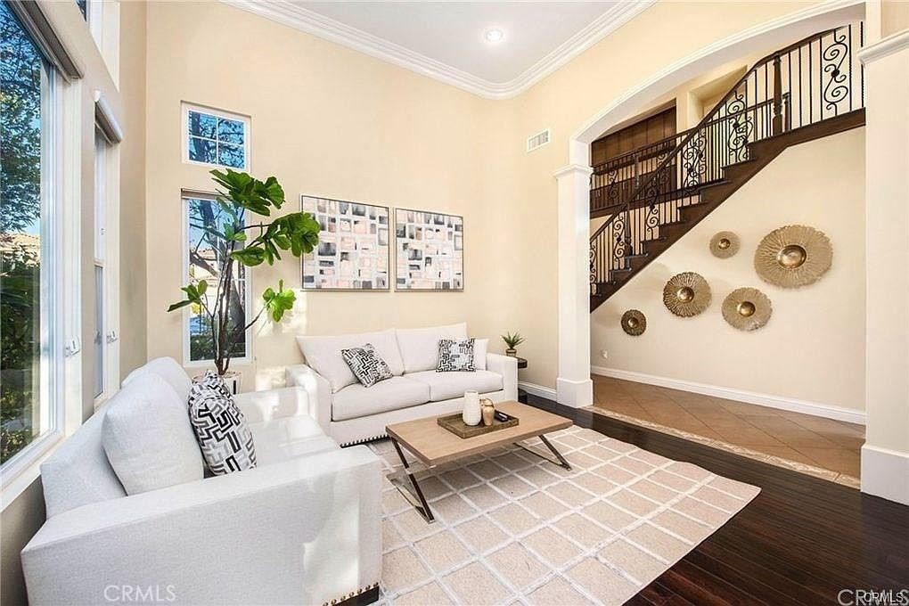 32 Walnut Creek Irvine, CA 92602 - Photo 3 of 24 a living room with patio