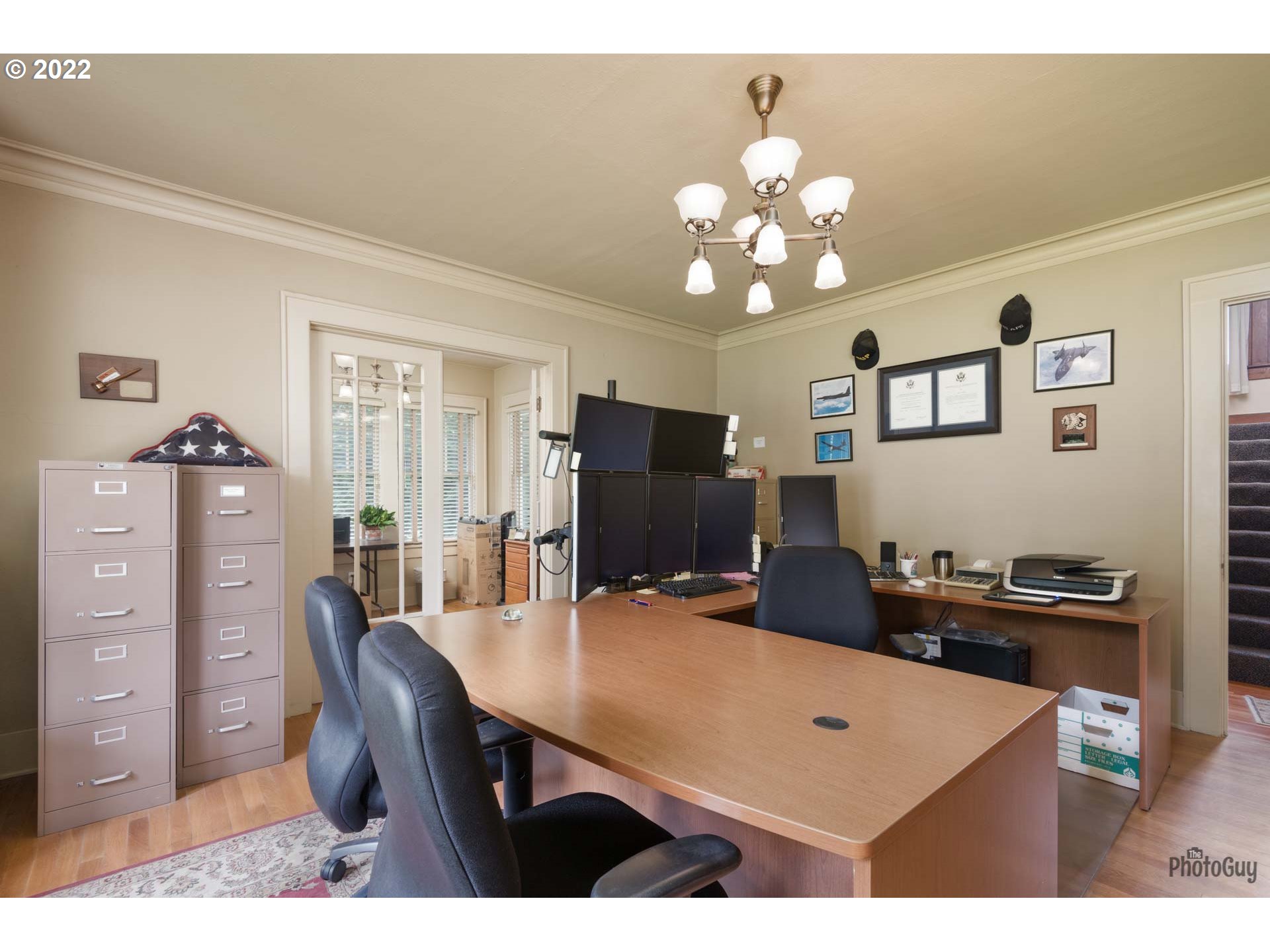 1410 River Road Eugene, OR 97404 - Photo 12 of 30 a view of a dining room with furniture and wooden floor