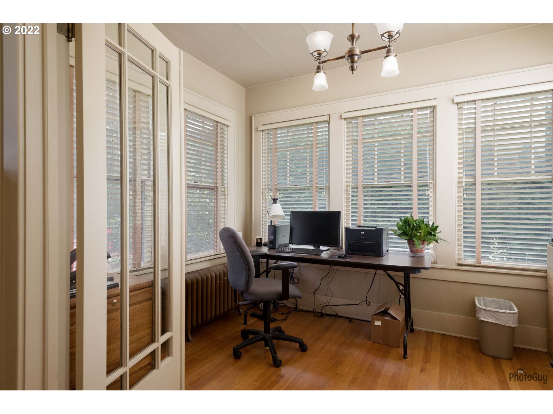 1410 River Road Eugene, OR 97404 - Photo 13 of 30 a view of a workspace with furniture and a window