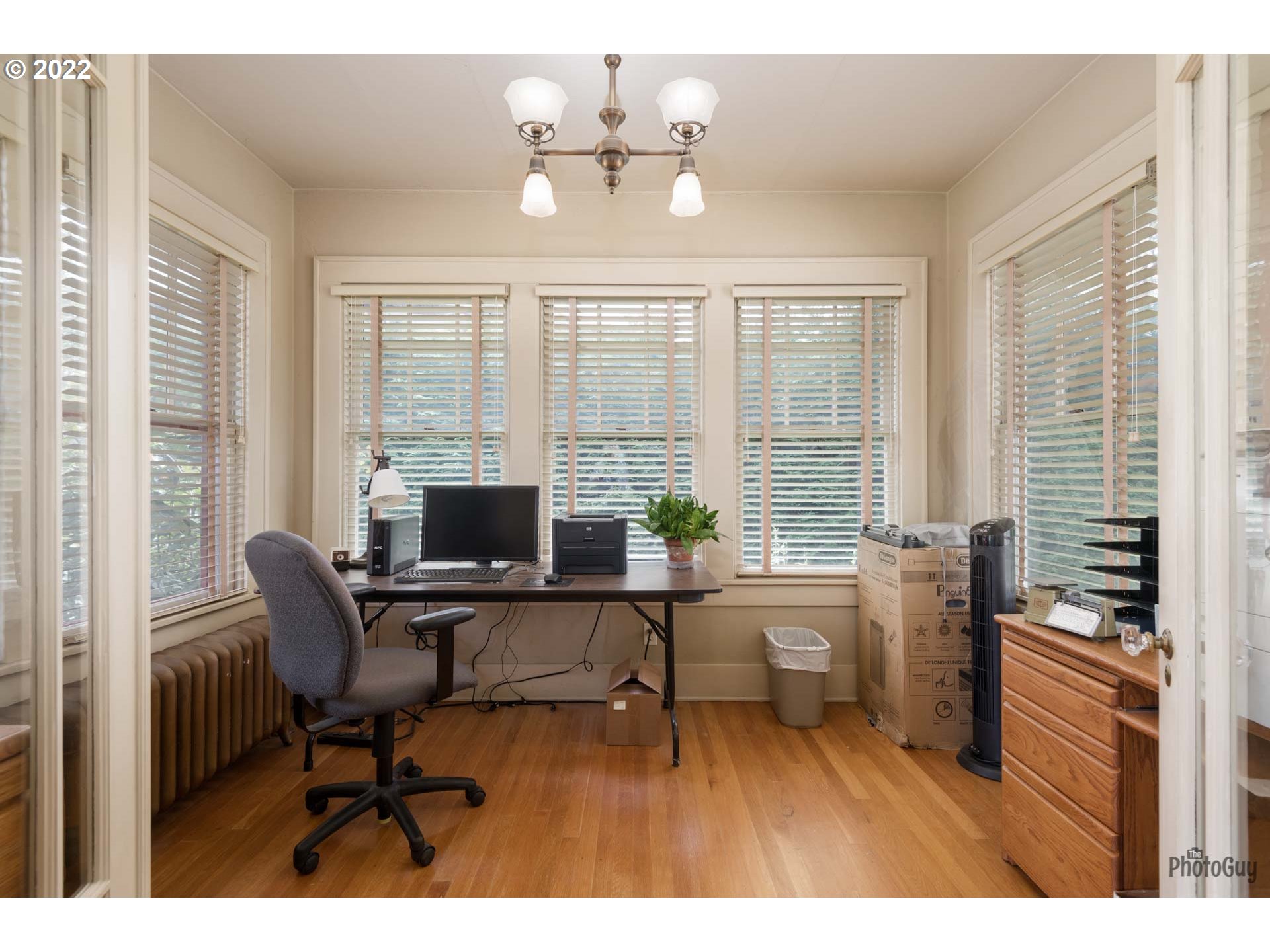 1410 River Road Eugene, OR 97404 - Photo 14 of 30 a view of a workspace with furniture and a window