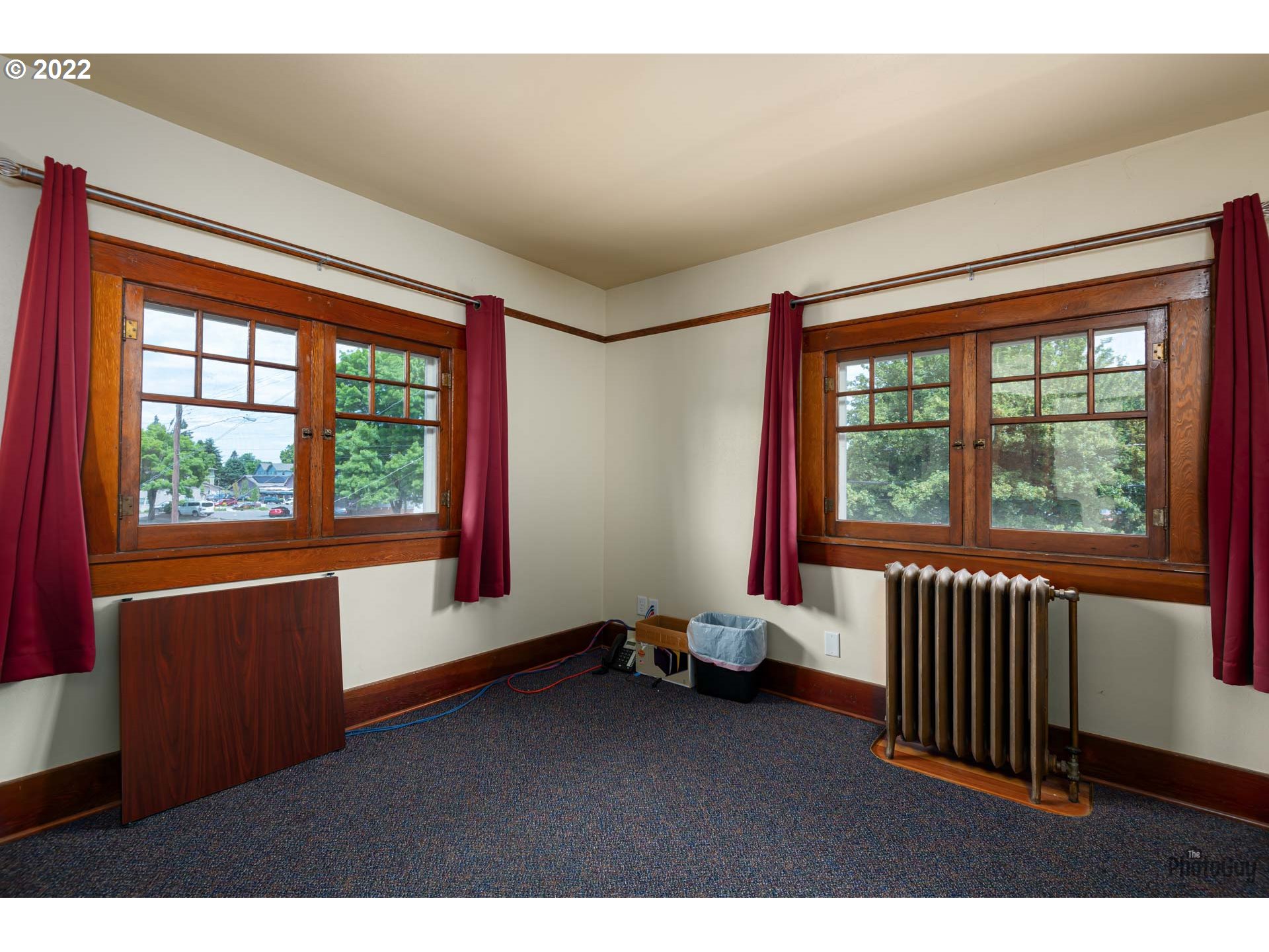 1410 River Road Eugene, OR 97404 - Photo 23 of 30 wooden floor in an empty room with a window