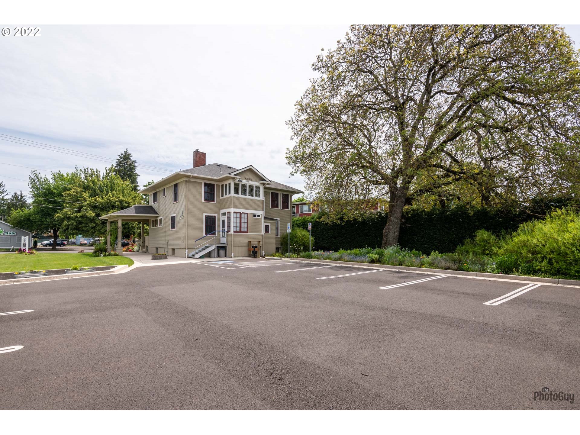 1410 River Road Eugene, OR 97404 - Photo 30 of 30 a front view of a house with a yard and garage