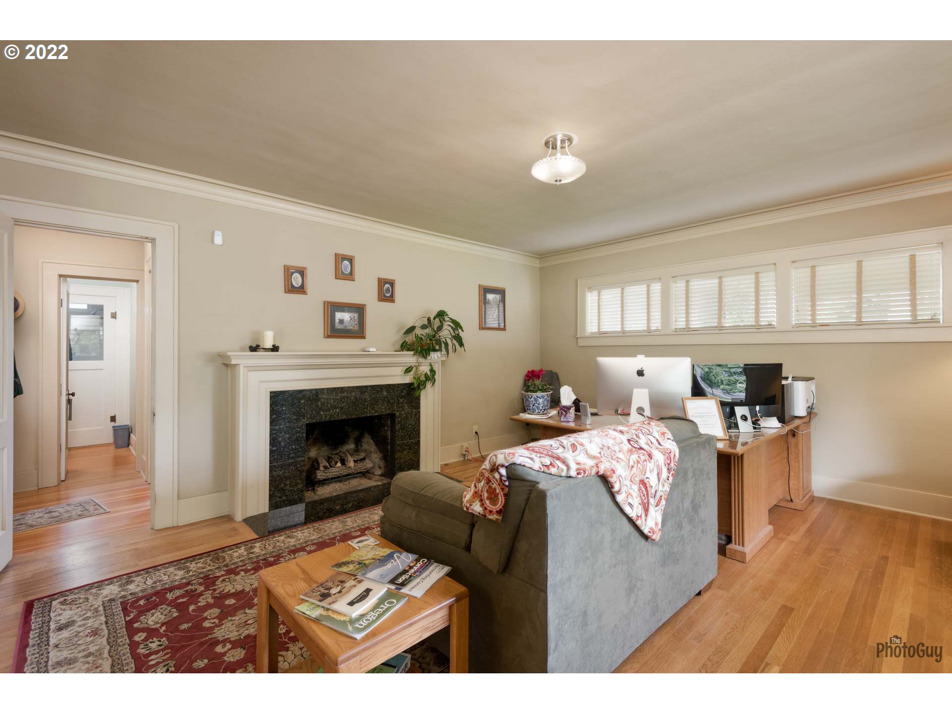 1410 River Road Eugene, OR 97404 - Photo 8 of 30 a living room with furniture and a fireplace