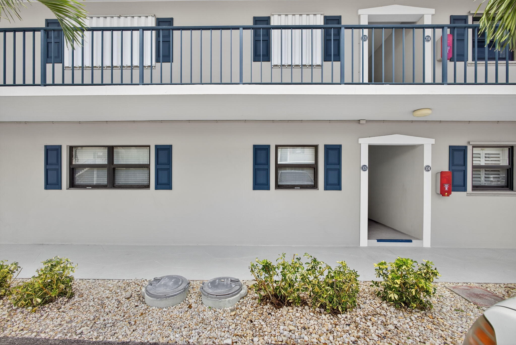 755 Saturn Street, Unit C105 Jupiter, FL 33477 - Photo 2 of 36 a front view of a house