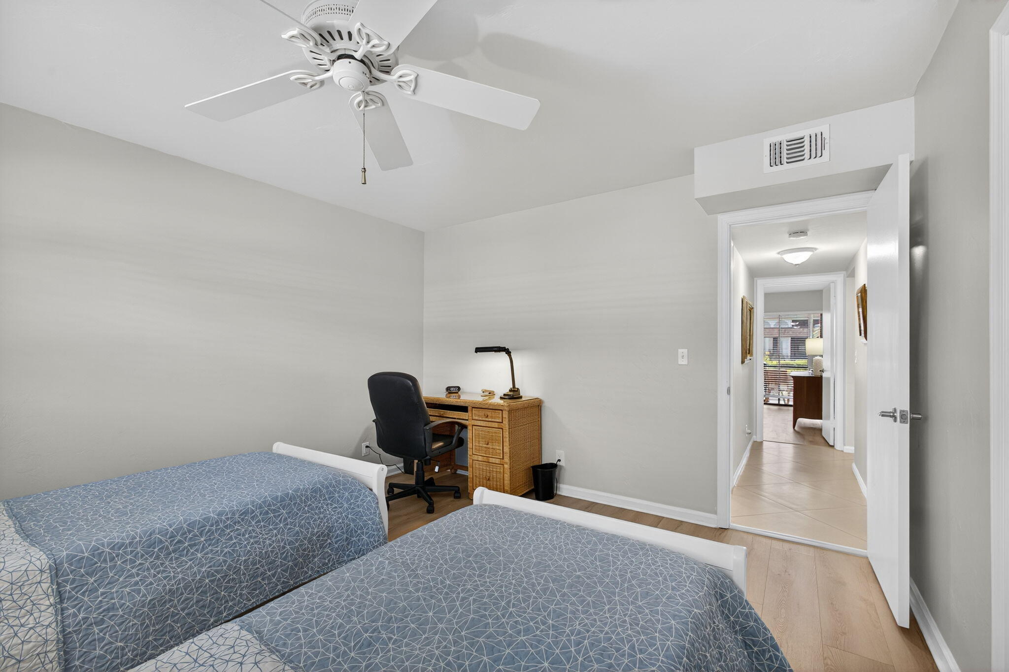 755 Saturn Street, Unit C105 Jupiter, FL 33477 - Photo 25 of 36 a bedroom with furniture and white walls