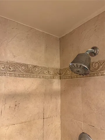 a view of bedroom with wooden floor