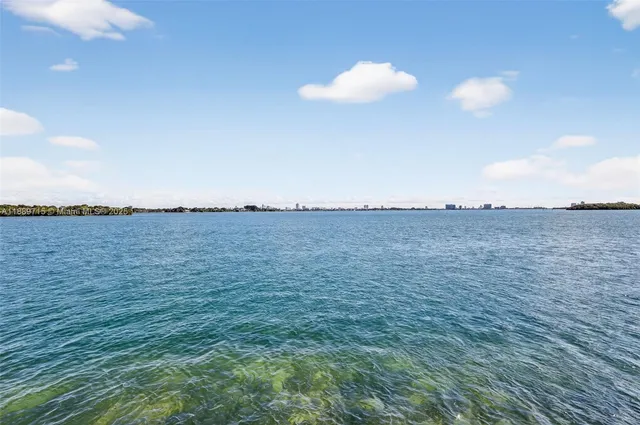 a view of a lake from a balcony