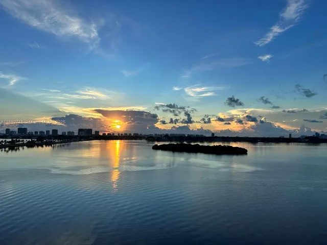 a view of lake and mountain