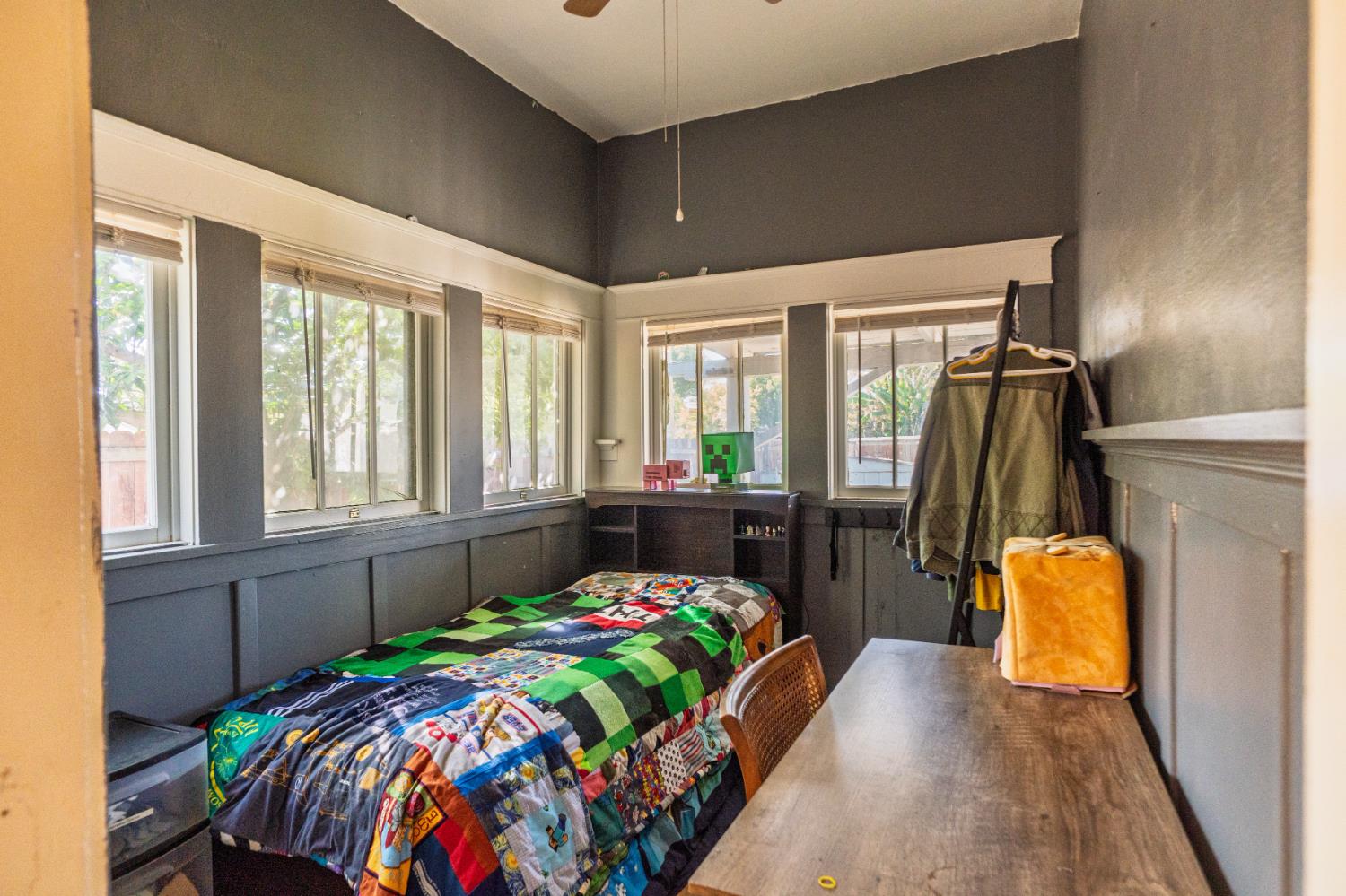 902 West 20th Street Merced, CA 95340 - Photo 13 of 48 a bedroom with bed and windows