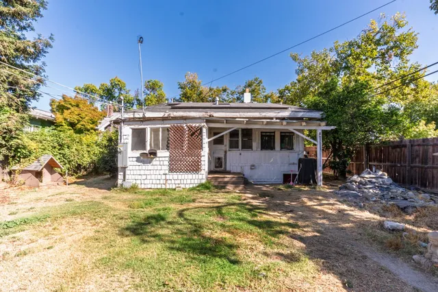 a bathroom with a sink a toilet and a shower