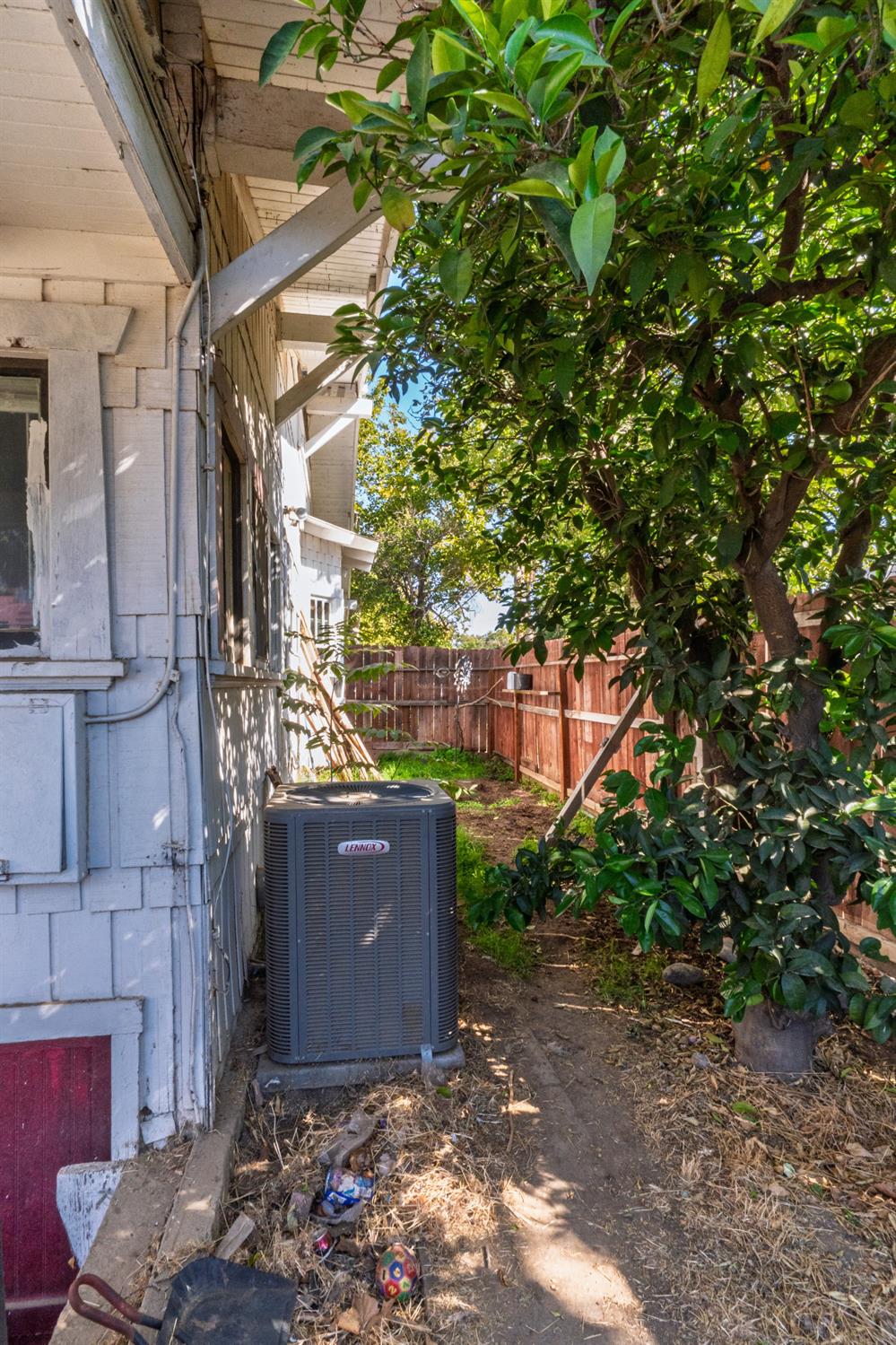 902 West 20th Street Merced, CA 95340 - Photo 36 of 48 a view of a house with a tree