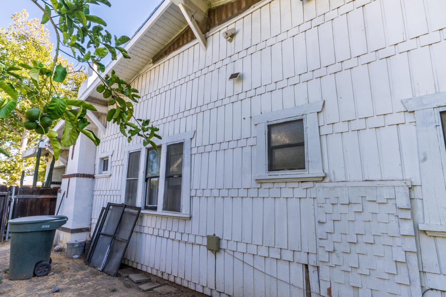 902 West 20th Street Merced, CA 95340 - Photo 37 of 48 a view of house with backyard and wooden fence