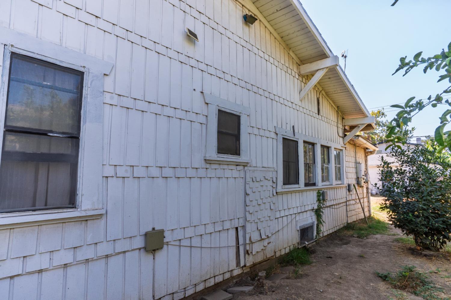 902 West 20th Street Merced, CA 95340 - Photo 38 of 48 a view of brick house with an outdoor space