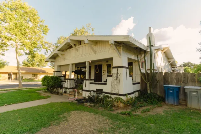 a aerial view of a house with swimming pool
