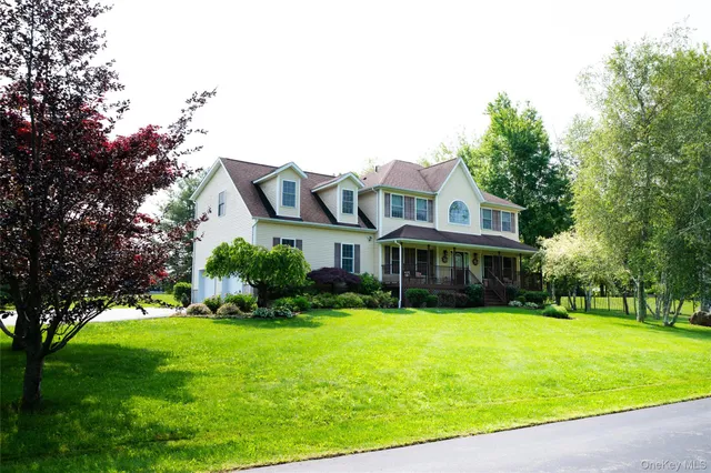 a view of a house with swimming pool