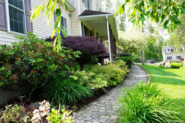 front view of a house with a small yard