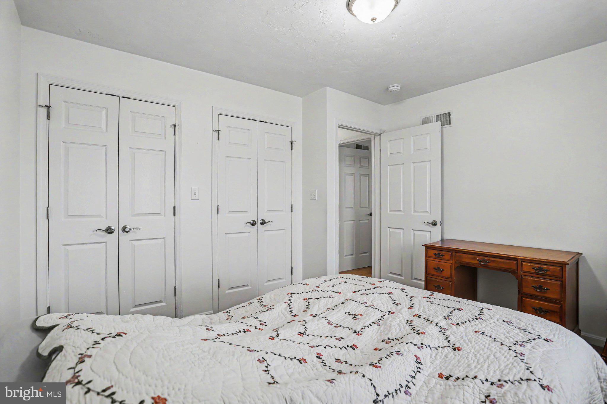 1371 Chami Drive, Unit 166 Spring Grove, PA 17362 - Photo 22 of 28 a bedroom with a bed and a window