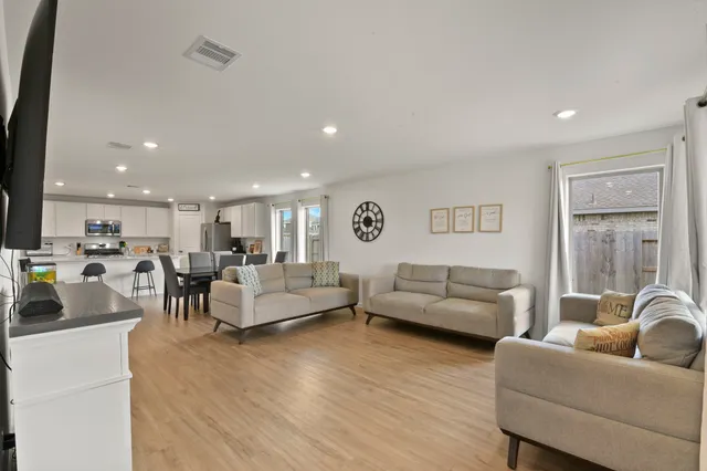 a living room with furniture and a couch