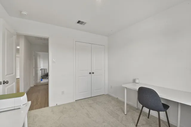 a bathroom with a toilet and a sink
