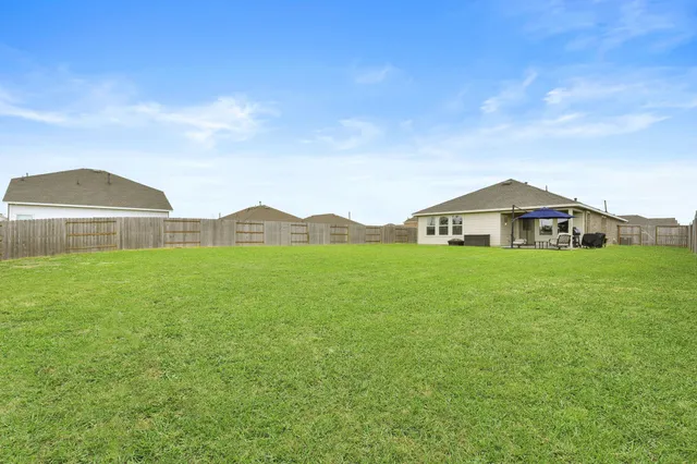 a house view with garden space