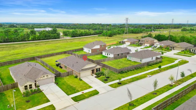 an aerial view of a house with a garden