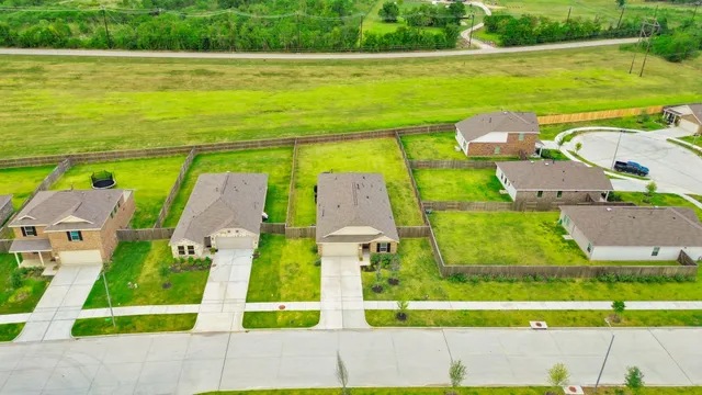 a view of houses with outdoor space and pool