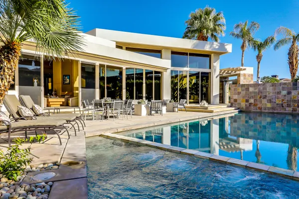 a view of a building with a sitting space