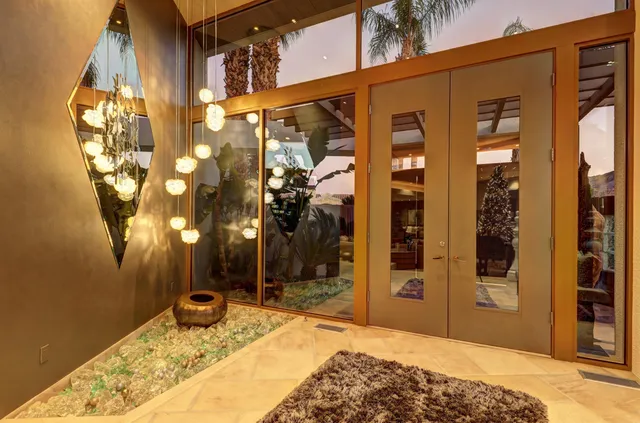 a bedroom with a bed and a table