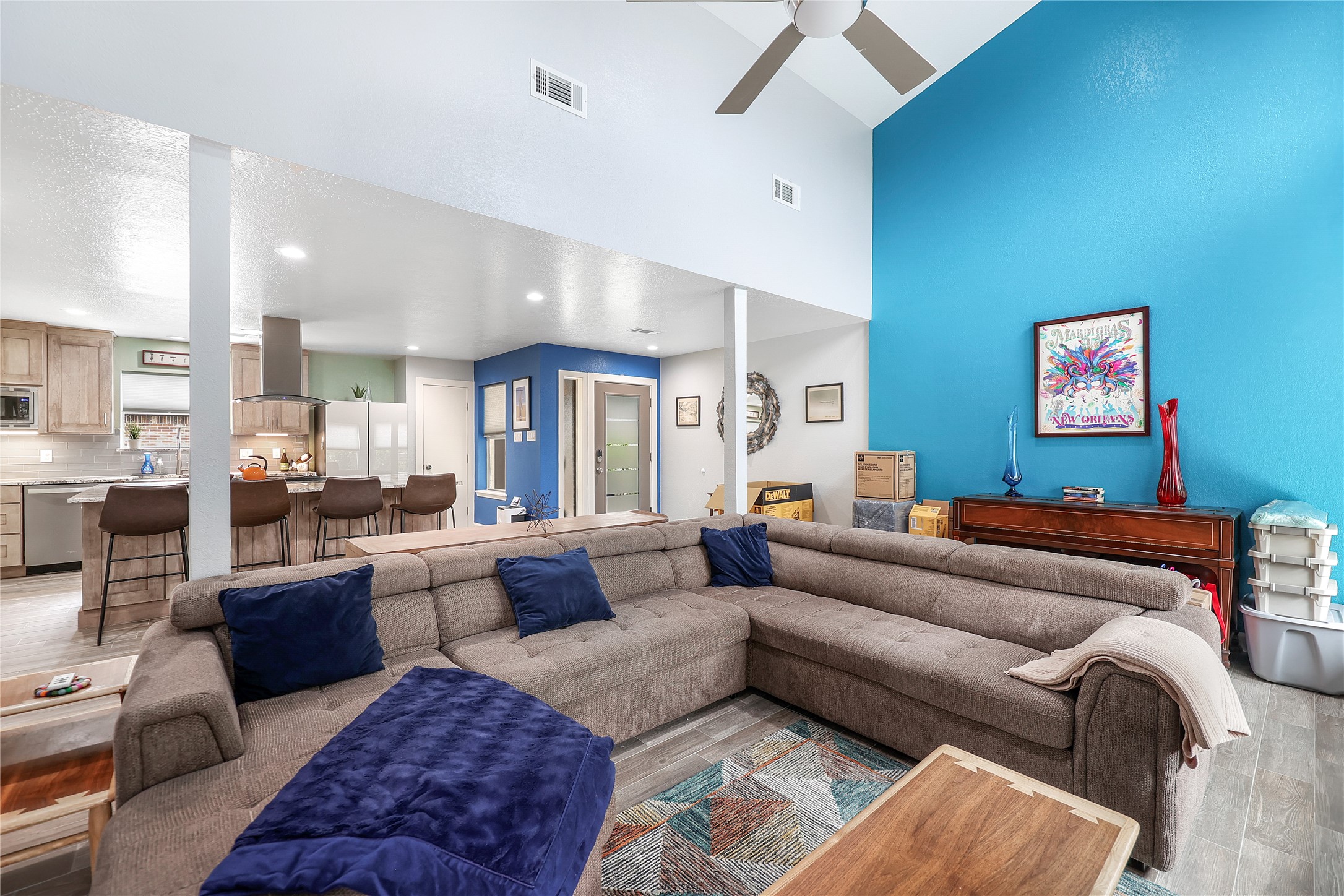 28831 South Diamondhead Conroe, TX 77356 - Photo 11 of 29 a living room with furniture or couch and a view of kitchen