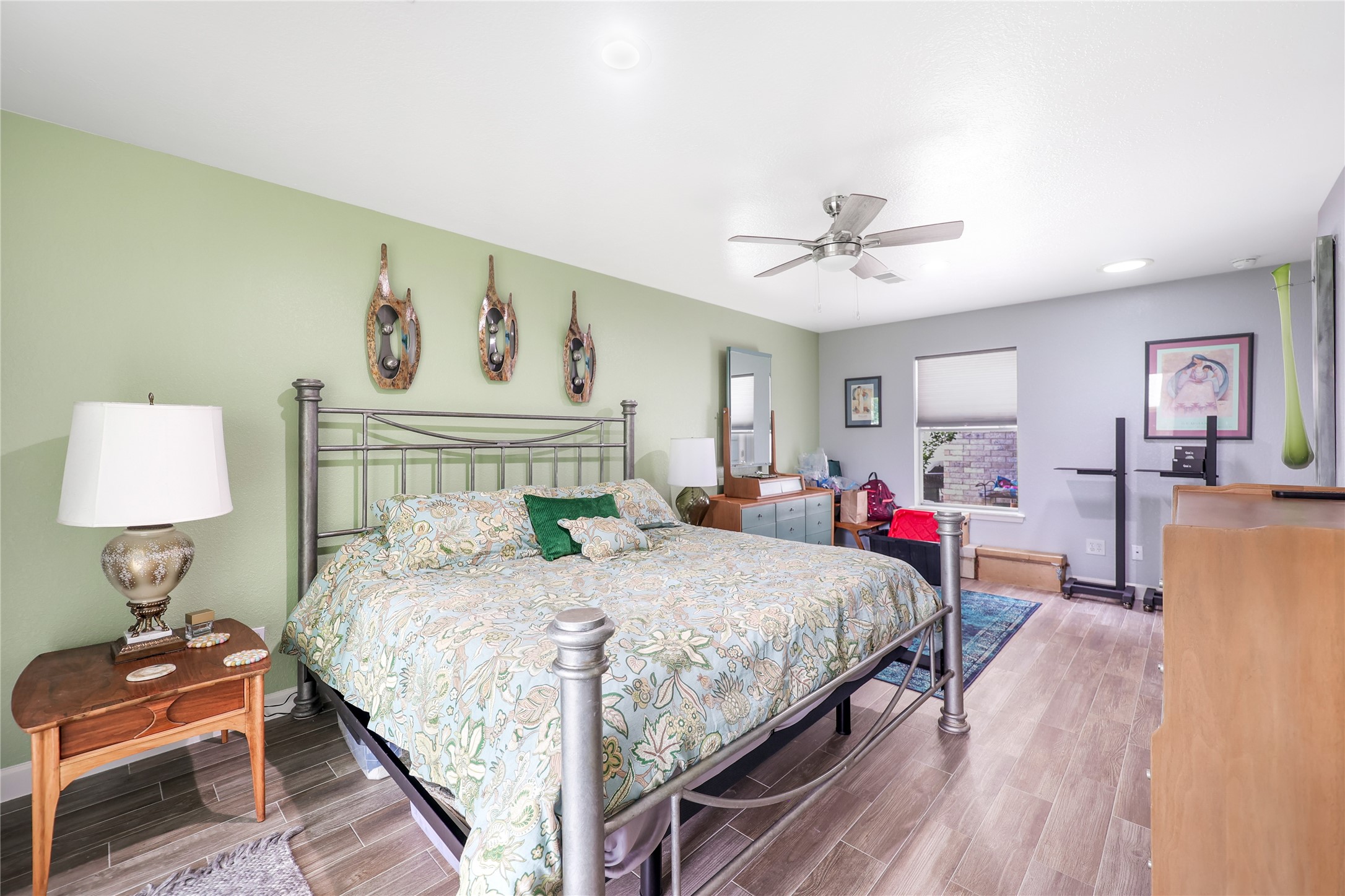 28831 South Diamondhead Conroe, TX 77356 - Photo 16 of 29 a bedroom with a bed and wooden floor