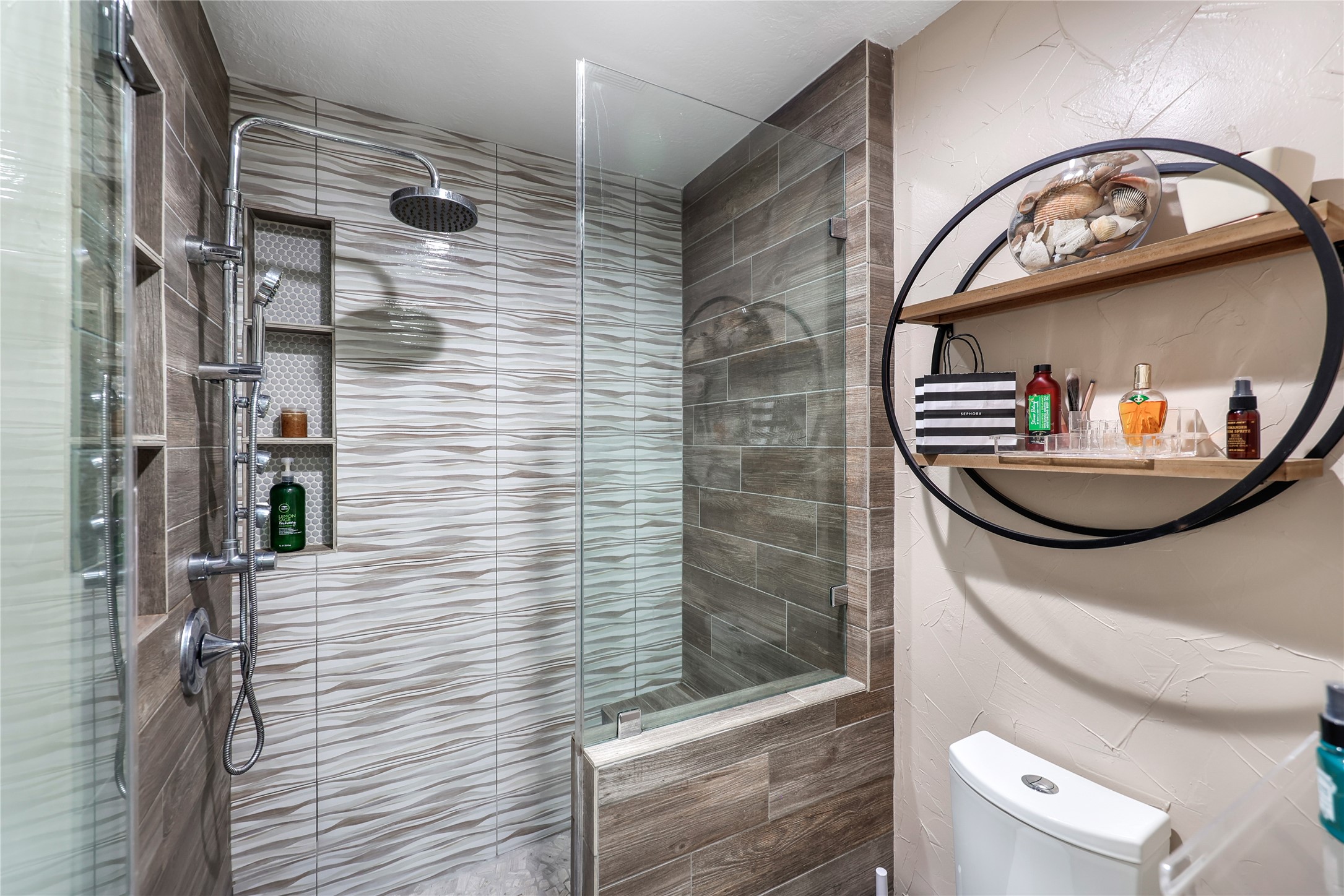 28831 South Diamondhead Conroe, TX 77356 - Photo 18 of 29 a bathroom with a toilet and a mirror