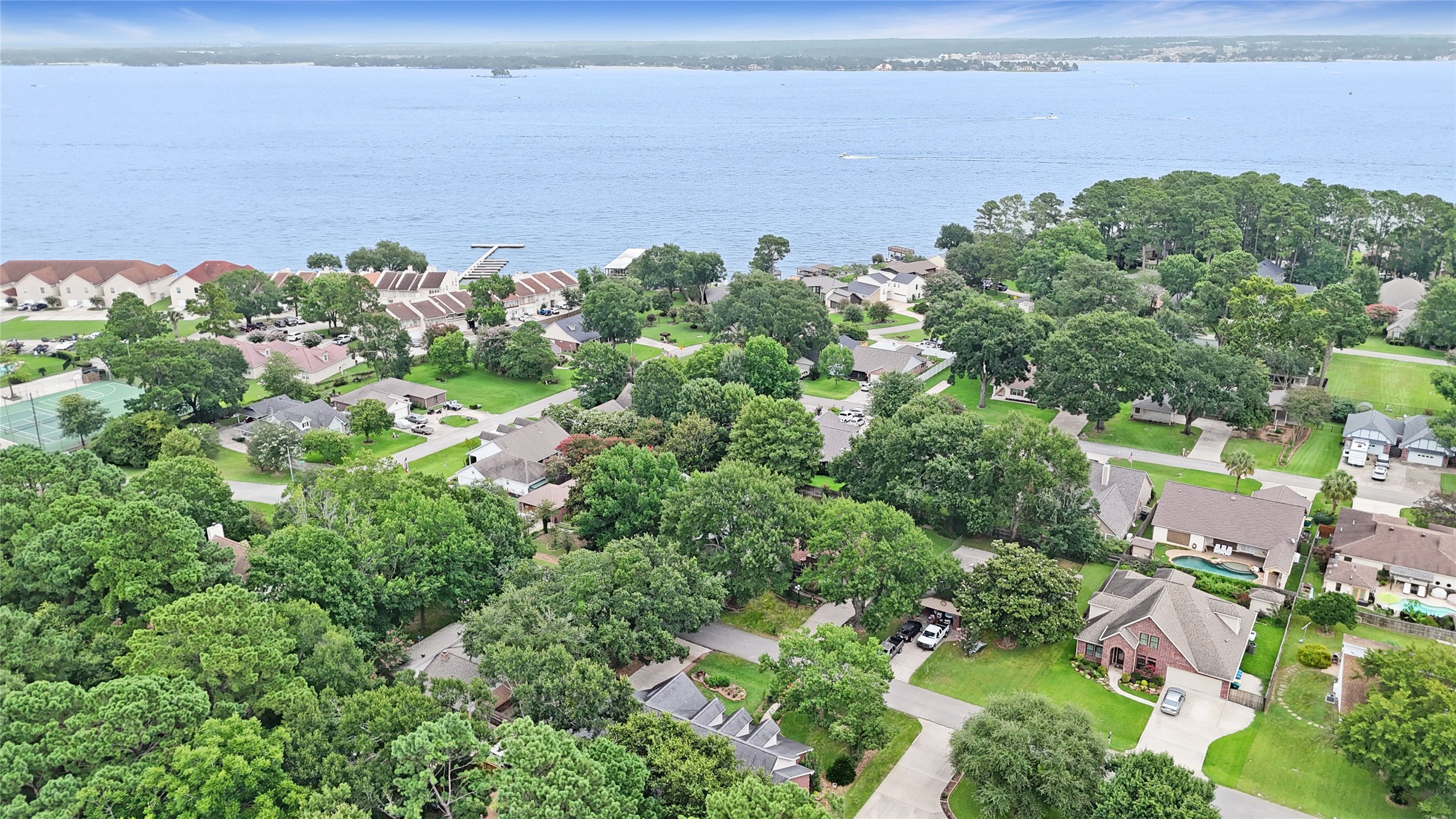 28831 South Diamondhead Conroe, TX 77356 - Photo 27 of 29 a view of a lake and mountain
