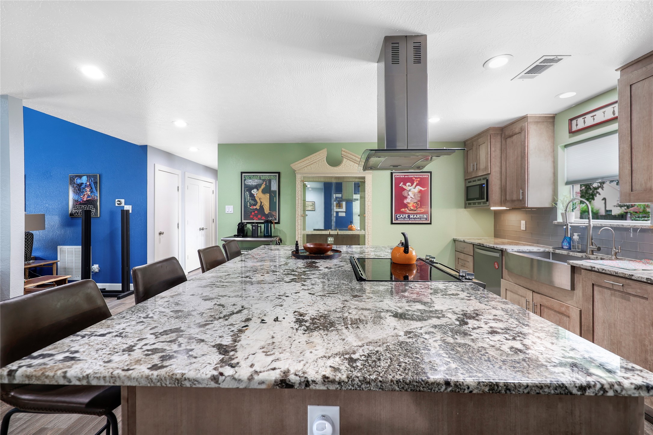 28831 South Diamondhead Conroe, TX 77356 - Photo 5 of 29 a kitchen with kitchen island granite countertop wooden cabinets and granite counter tops