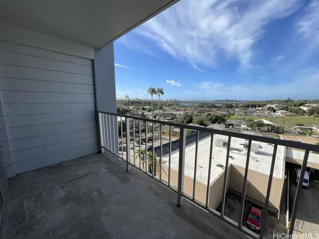 a view of a balcony with city view