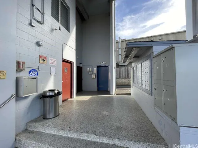 a view of a hallway with seating area