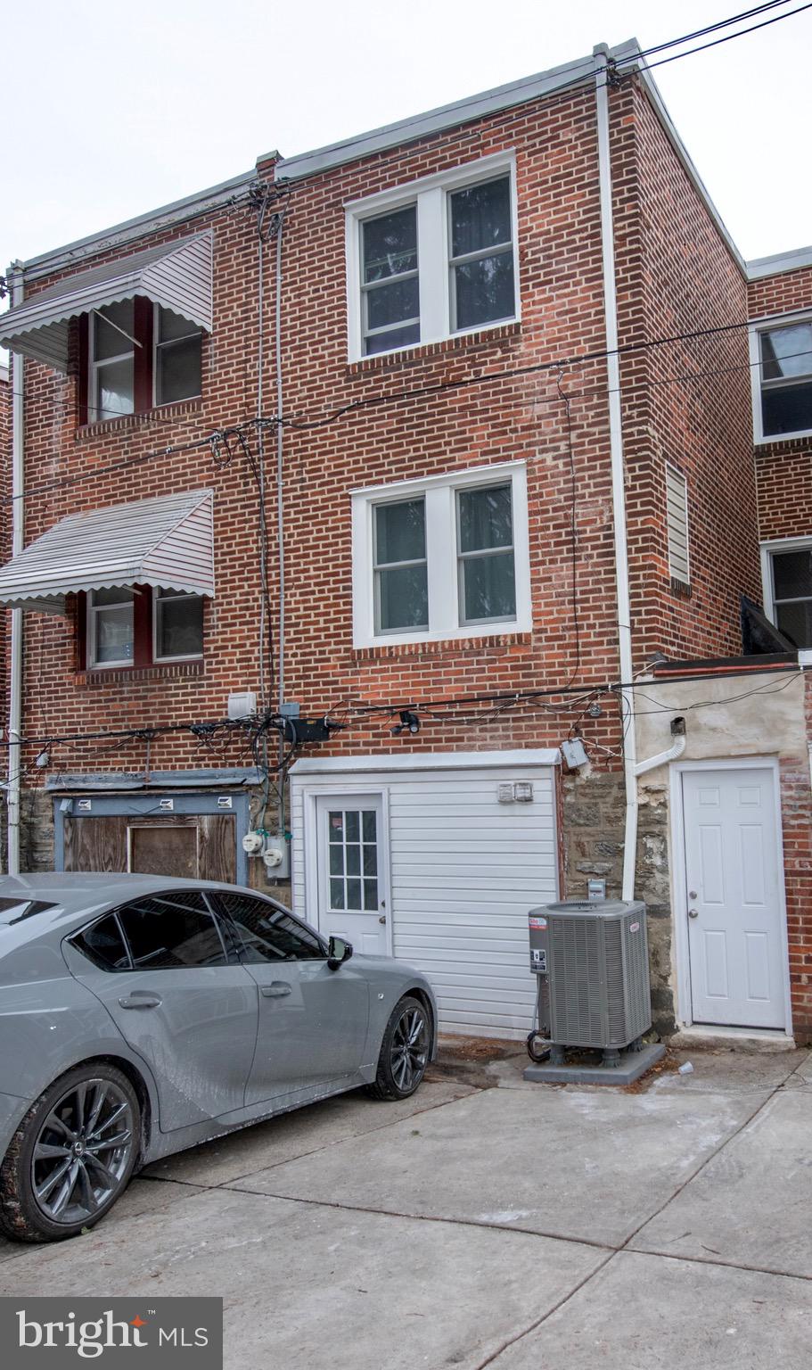 4930 Pulaski Avenue Philadelphia, PA 19144 - Photo 18 of 22 a view of a car parked in front of a building