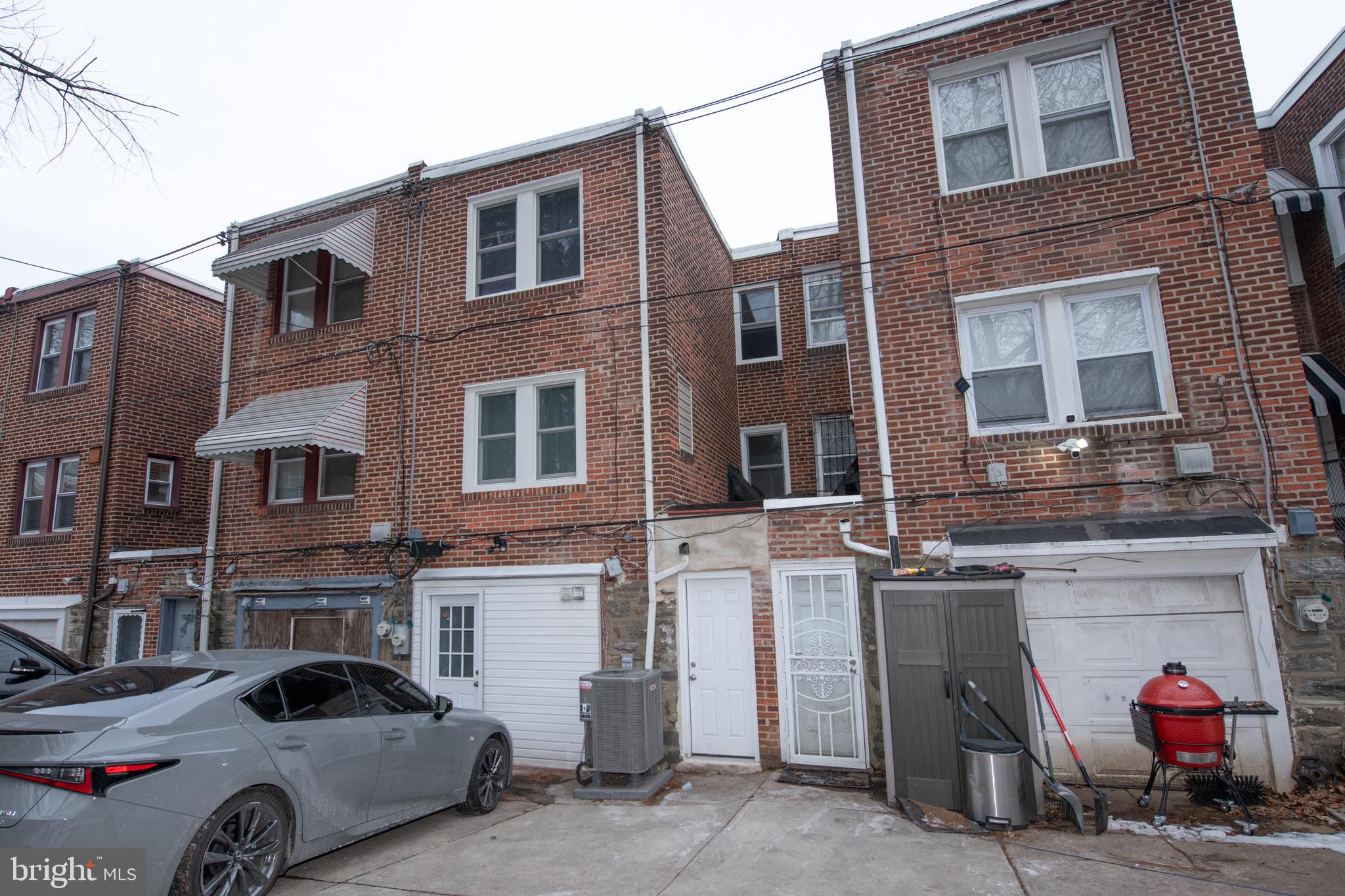 4930 Pulaski Avenue Philadelphia, PA 19144 - Photo 19 of 22 a couple of cars parked in front of a building